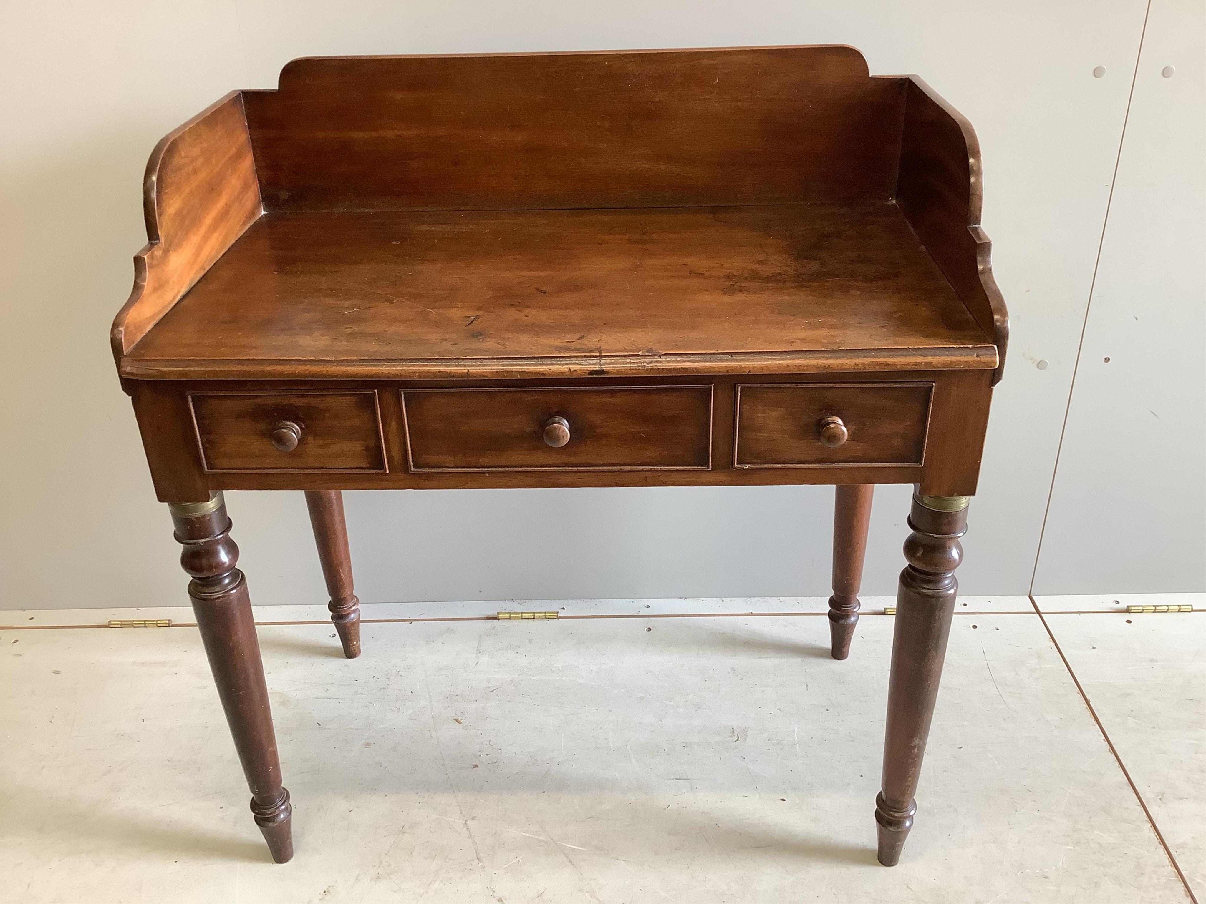 An early Victorian mahogany washstand, width 88cm, depth 49cm, height 95cm. Condition - fair